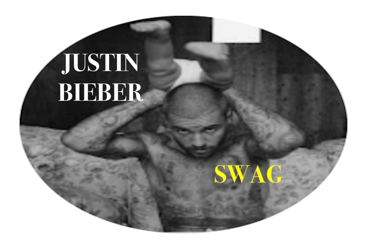 Justin Bieber posando con su hijo Jack Blues en la portada de su nuevo álbum 'Swag'